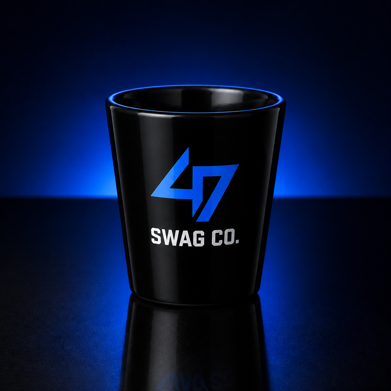Black custom 2 oz coated shot glass with 47 Swag Co branding
