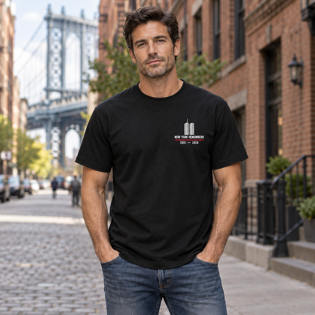 Model wearing black New York Remembers T-shirt with small left chest print