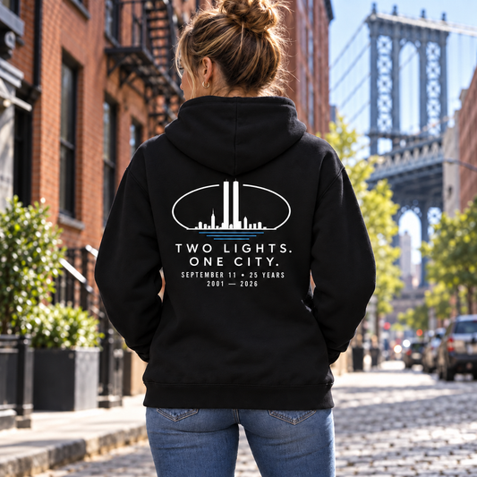 9/11 25th Anniversary Memorial Hoodie – Two Lights. One City. — single black garment back view