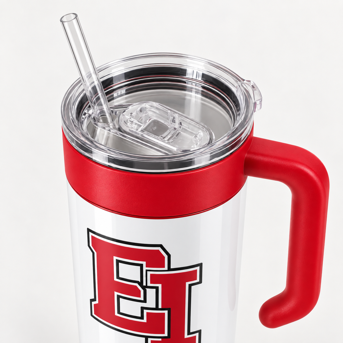 Close view of the included clear sliding lid, straw and red screw-on handle on the East Islip 40 oz tumbler