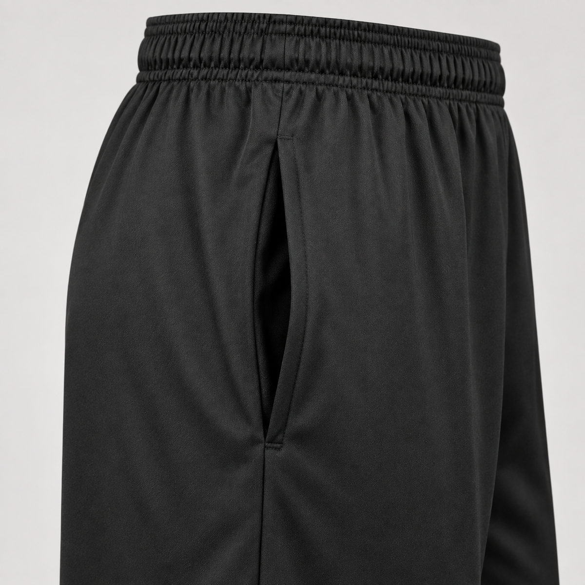 Detail of Black East Islip 7-inch shorts side-seam pocket and elastic waistband