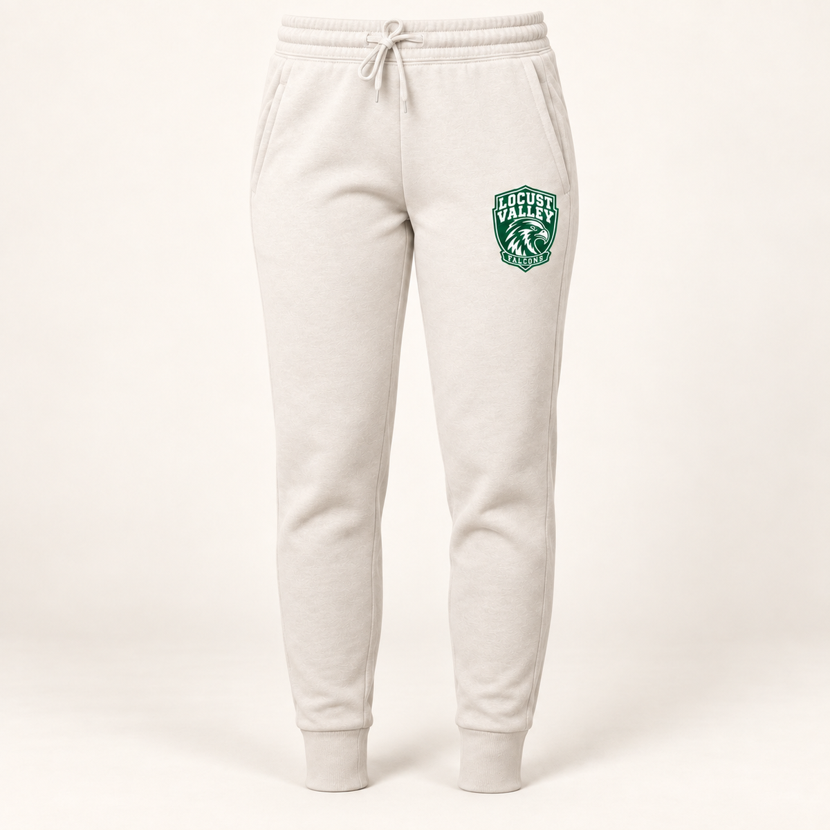 Locust Valley women's Falcon Crest joggers in Bone, front view with forest-green and white left-leg crest