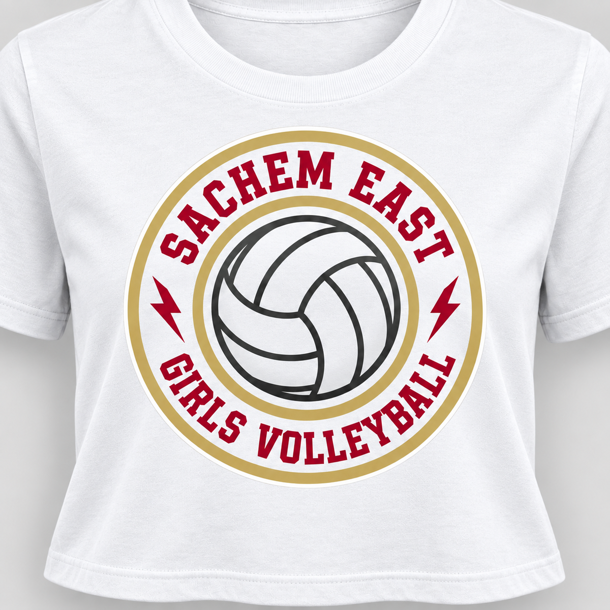Sachem East Girls Volleyball Ace Club Women's Crop Tee in White, close-up of the red-and-gold center-front volleyball print and cropped hem