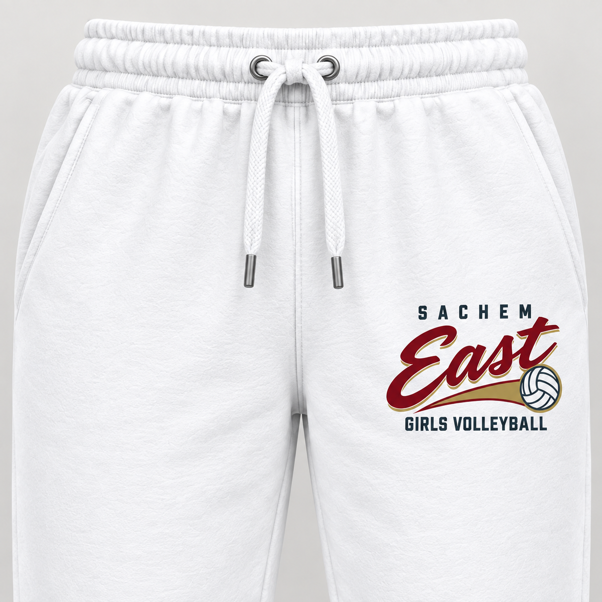 Sachem East Girls Volleyball Rally Script Joggers in White, close-up of the red-and-gold left-thigh volleyball print