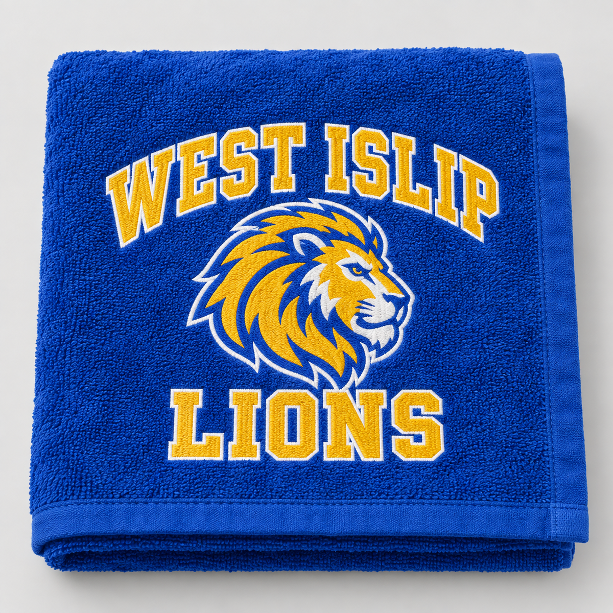West Islip Lions royal blue beach towel, folded detail view